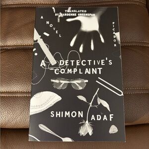 A Detective's Complaint by Shimon Adaf - Black Cover